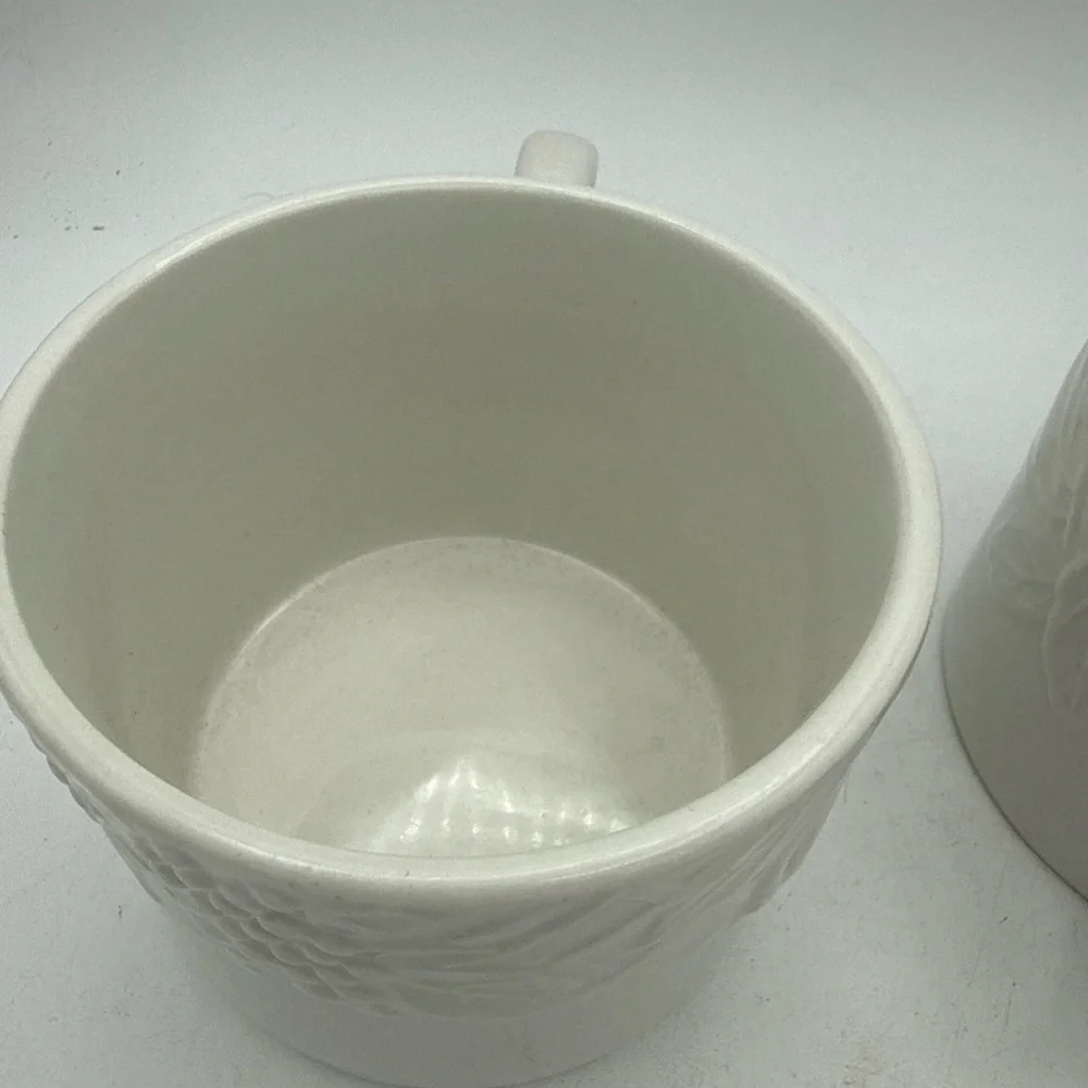 Pair Of Pier 1 Coffee Mugs White raised Fruit grape pears strawberries design
